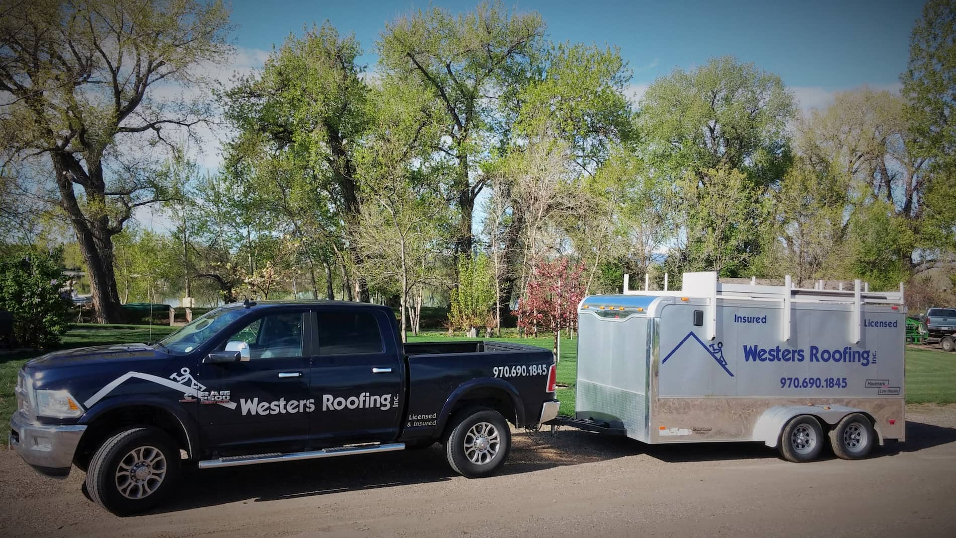 Westers Roofing truck and trailer with Westers Roofing letting